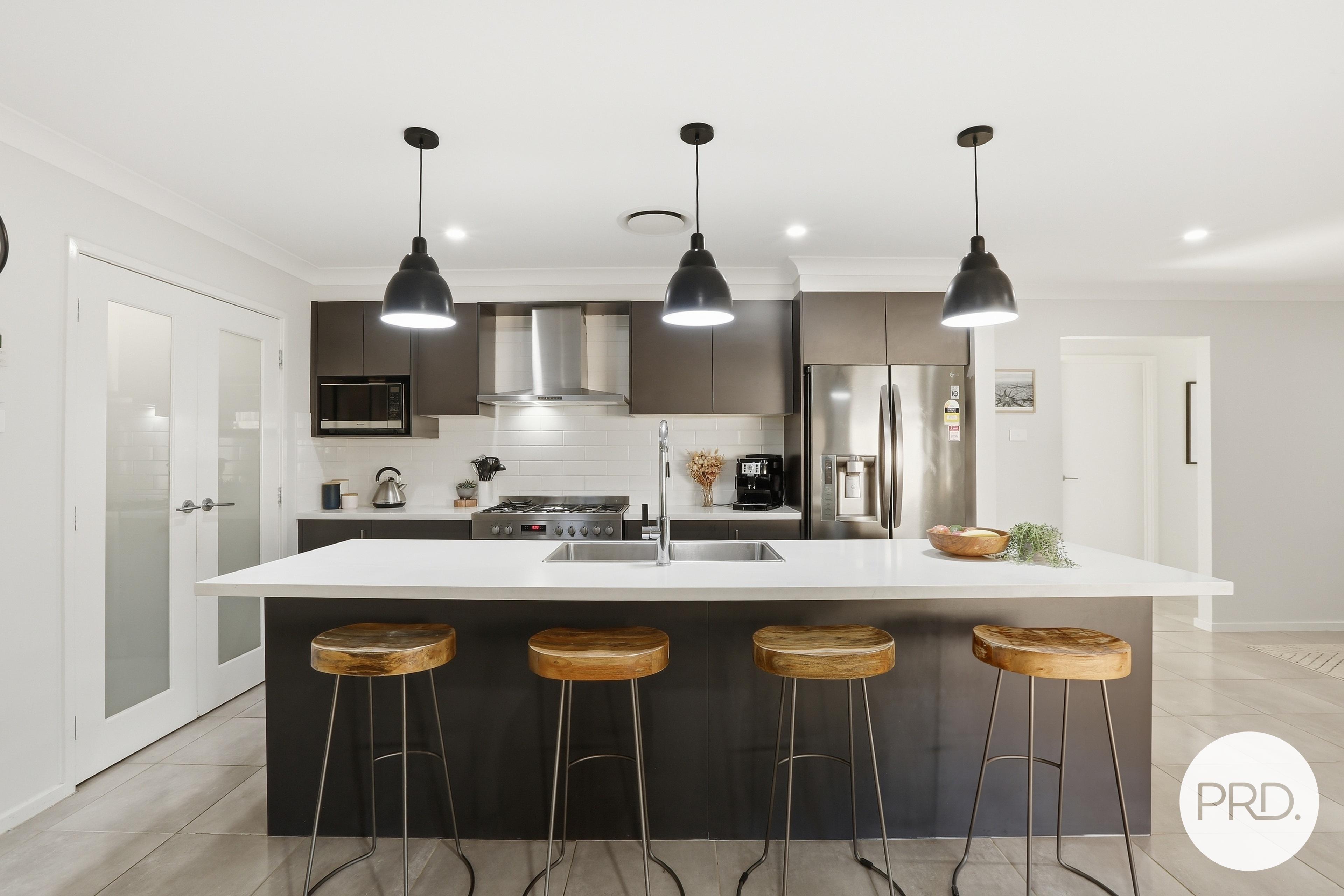 4 MITTAGONG STREET, Tullimbar NSW 2527 - Image 1