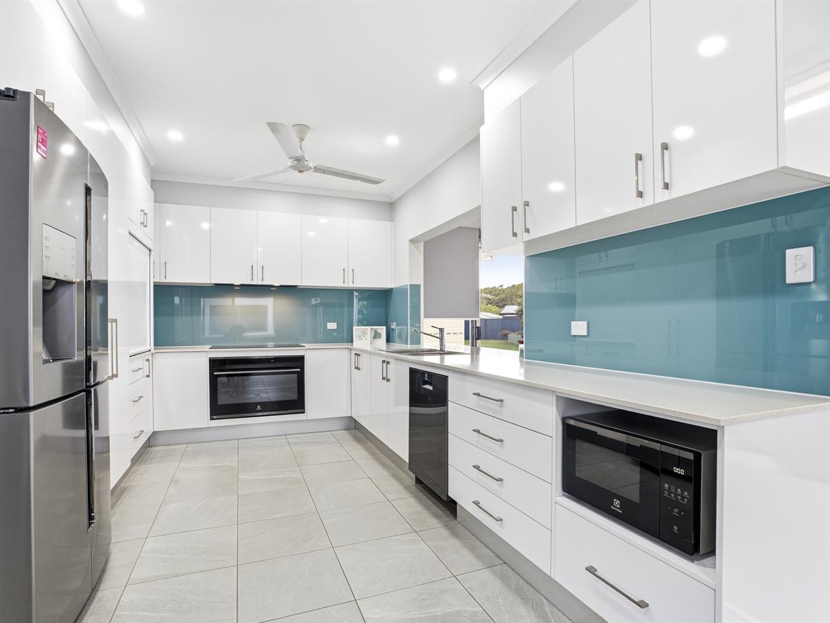 12 ILLICH STREET, Kurrimine Beach QLD 4871 - Image 1